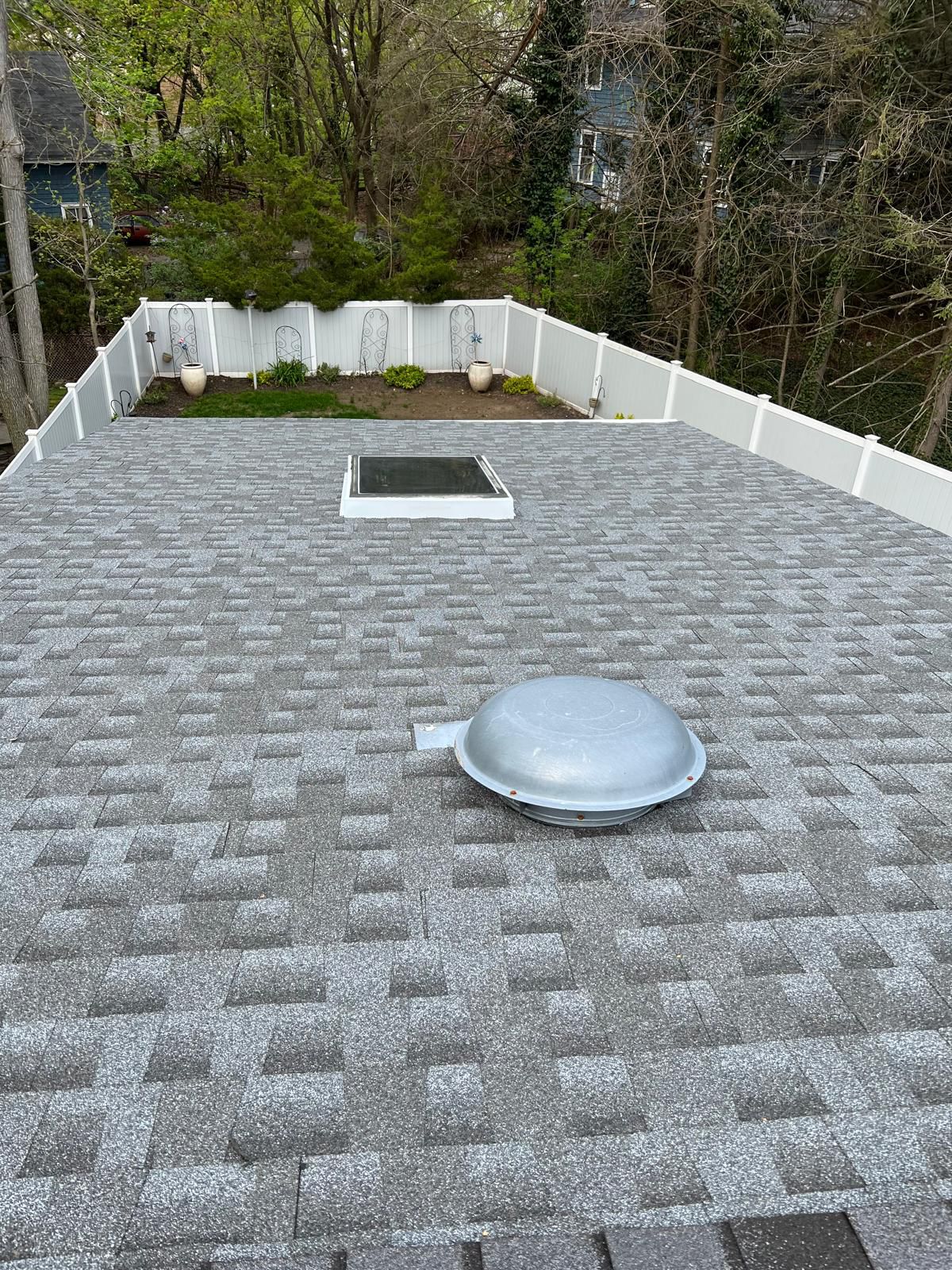 Low-slope flat roof system with vent stacks installed in Northern NJ