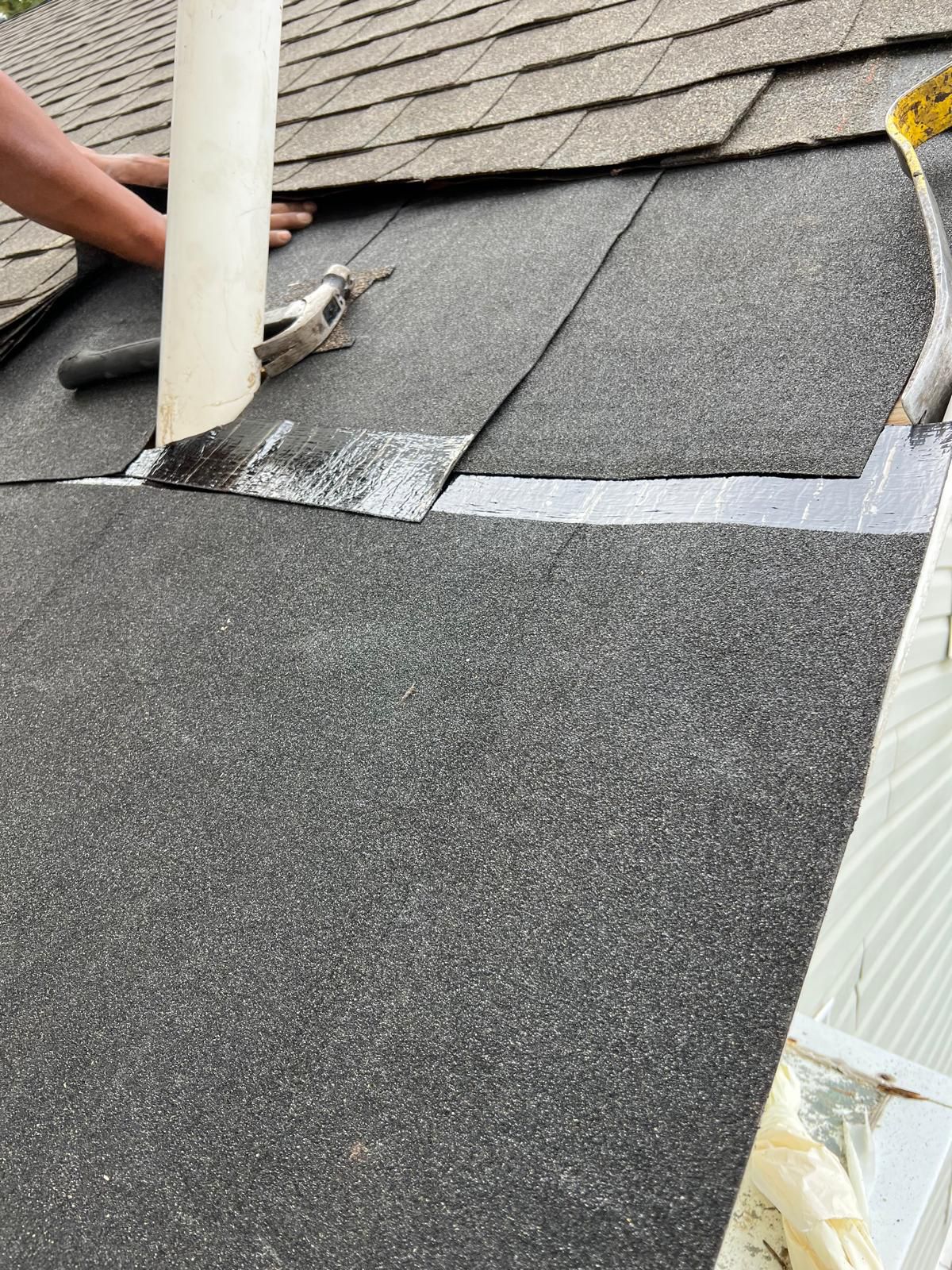 Roof leak repair on a Northern NJ home — new flashing and ice-and-water shield installed at a plumbing vent boot by Randy's Roofing Construction