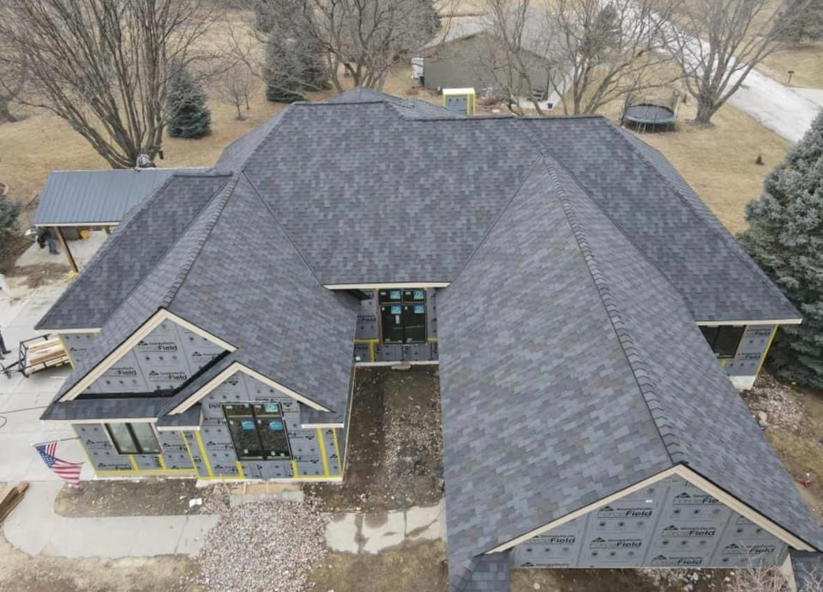 Aerial view of completed full roof replacement on a Fort Lee NJ home — GAF Timberline HDZ Charcoal architectural shingles