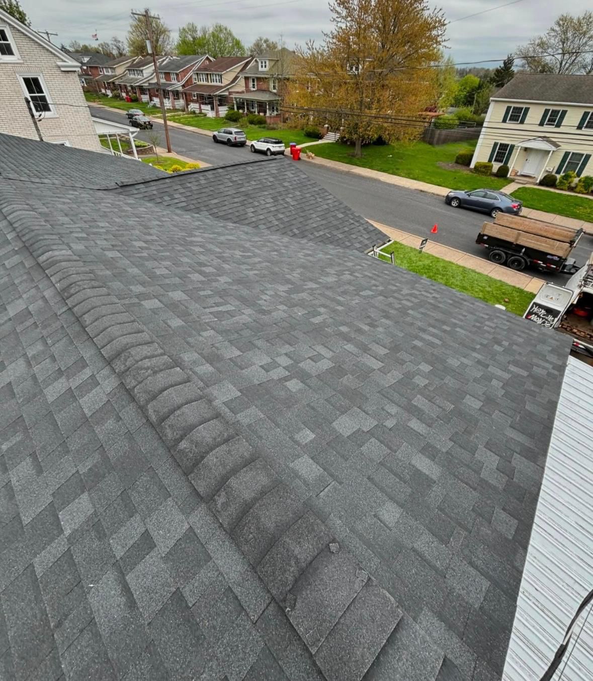 Charcoal architectural shingle roof installed on a residential home in NJ