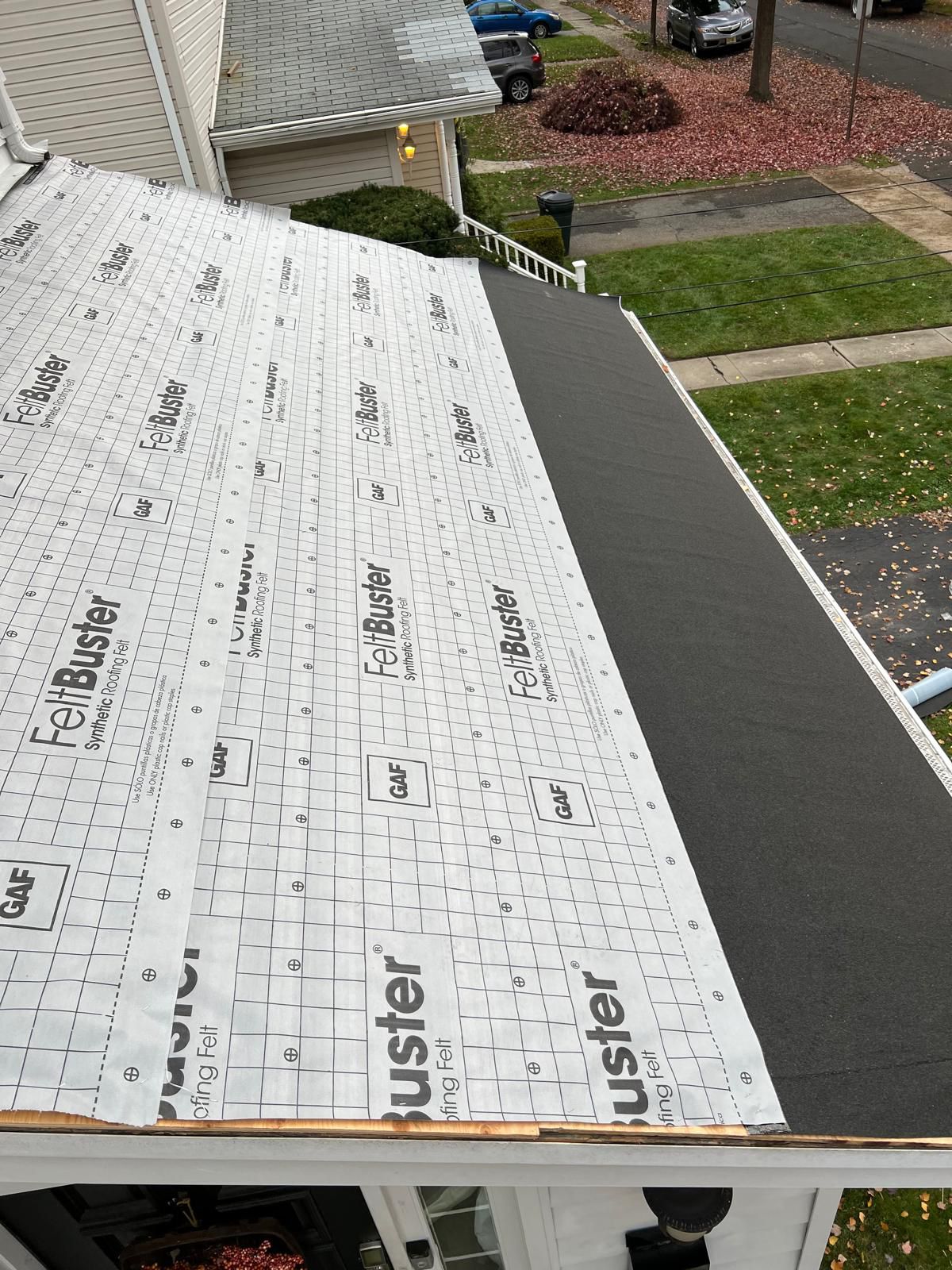 GAF FeltBuster synthetic underlayment installed across a residential roof deck