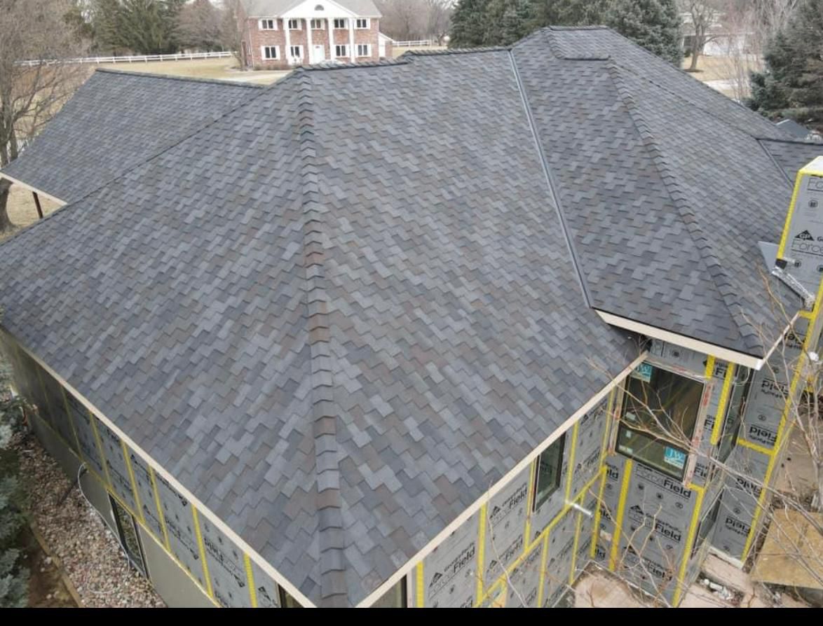 Finished multi-pitch architectural shingle roof on new construction in NJ