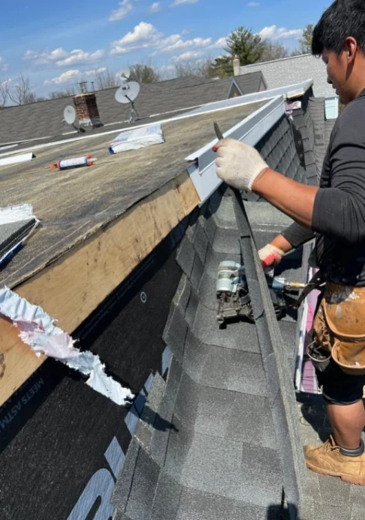 Randy's Roofing crew installing a new roof